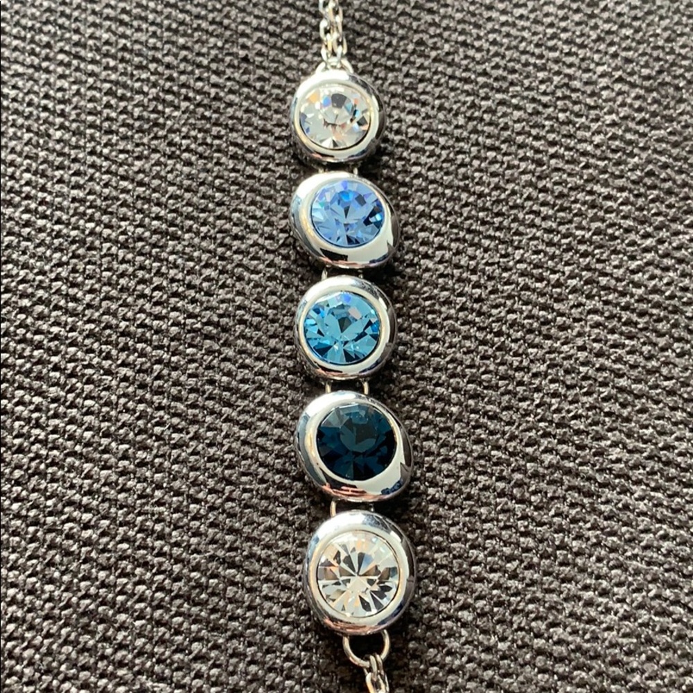 New beautiful silver bracelet with blue crystals